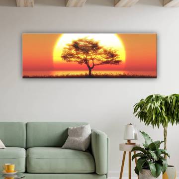 Egy fa a naplementében vászonkép